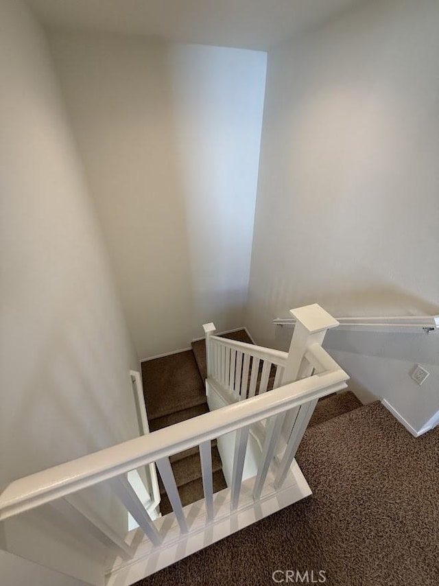 16722 Nicklaus Dr Unit 47, Rancho Cascades, CA 91342 - staircase with carpet floors