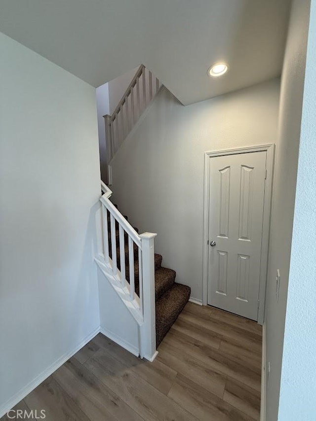 16722 Nicklaus Dr Unit 47, Rancho Cascades, CA 91342 - stairway featuring wood finished floors, baseboards, and recessed lighting