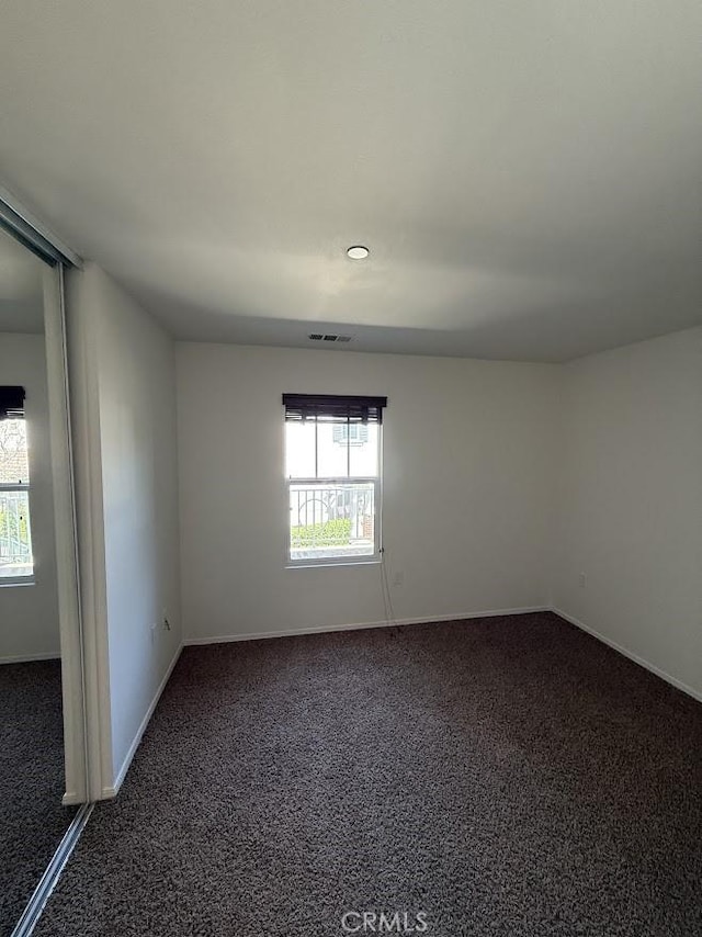 16722 Nicklaus Dr Unit 47, Rancho Cascades, CA 91342 - unfurnished room featuring dark carpet and baseboards