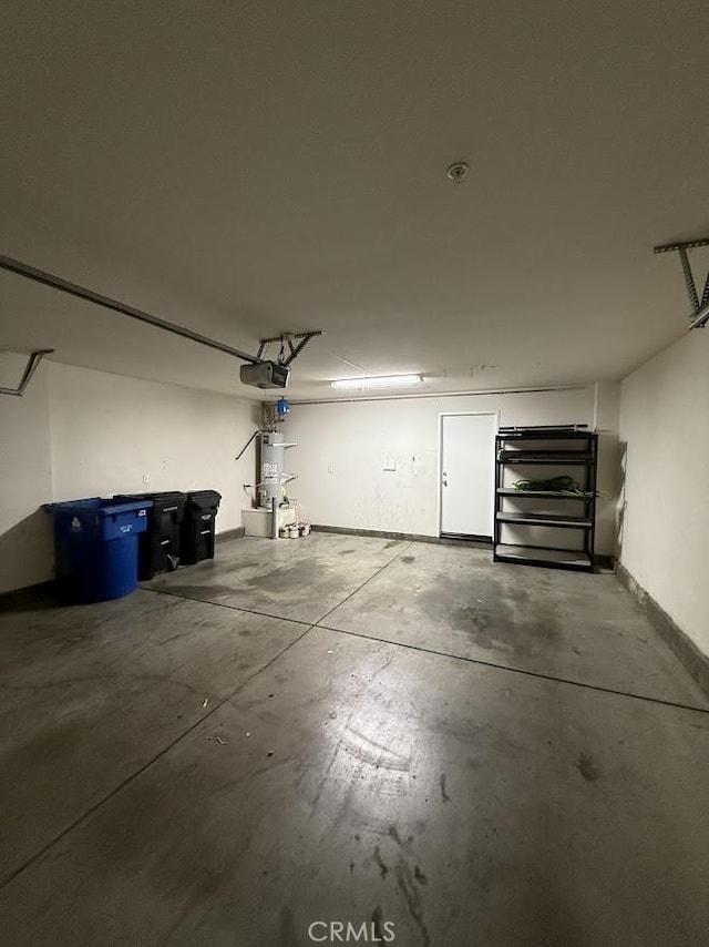16722 Nicklaus Dr Unit 47, Rancho Cascades, CA 91342 - garage featuring a garage door opener and water heater