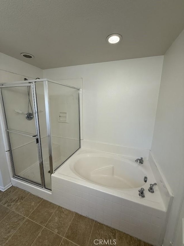 16722 Nicklaus Dr Unit 47, Rancho Cascades, CA 91342 - full bathroom with a shower stall, a garden tub, recessed lighting, and tile patterned flooring