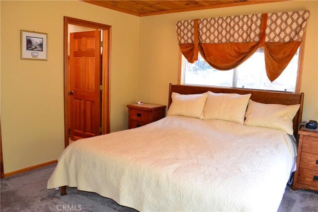 15433 Acacia Way, Pine Mountain Club, CA 93225 - carpeted bedroom with wooden ceiling and baseboards