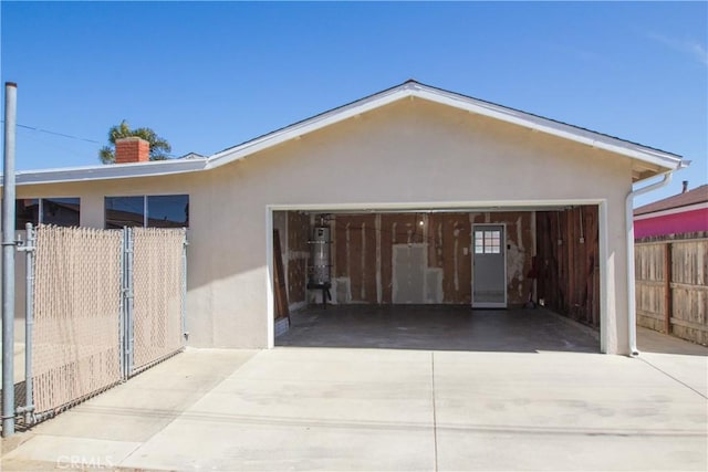 garage with fence