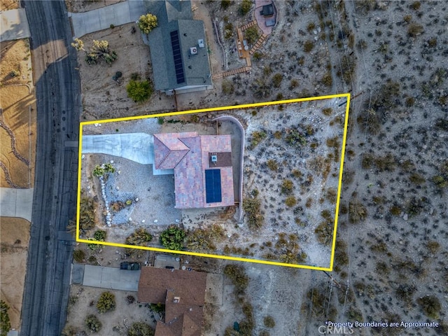 8244 Balsa Ave, Yucca Valley, CA 92284 - aerial overview of property's location featuring property boundaries highlighted and a desert landscape
