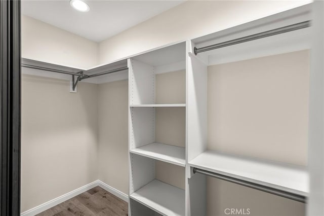 8244 Balsa Ave, Yucca Valley, CA 92284 - walk in closet with wood finished floors