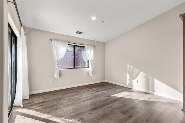8244 Balsa Ave, Yucca Valley, CA 92284 - spare room with wood finished floors and recessed lighting
