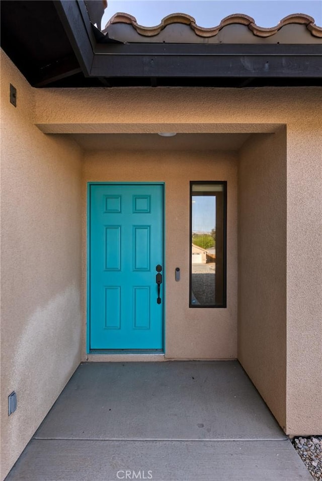8244 Balsa Ave, Yucca Valley, CA 92284 - property entrance with stucco siding