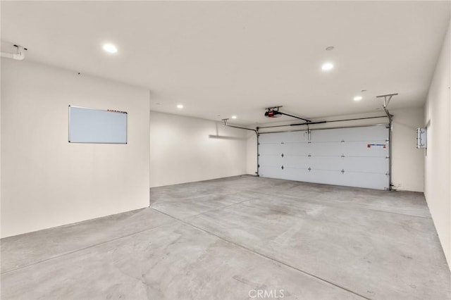 8244 Balsa Ave, Yucca Valley, CA 92284 - garage with recessed lighting and a garage door opener