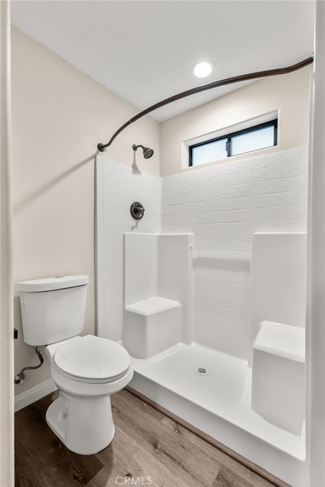 8244 Balsa Ave, Yucca Valley, CA 92284 - full bath with toilet, wood finished floors, and a tile shower