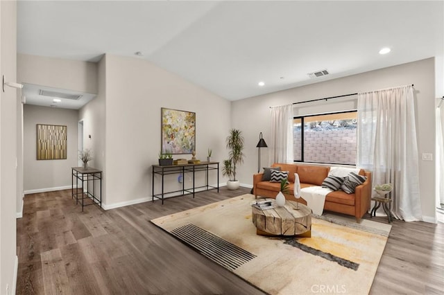 8244 Balsa Ave, Yucca Valley, CA 92284 - living room with vaulted ceiling, wood finished floors, and recessed lighting