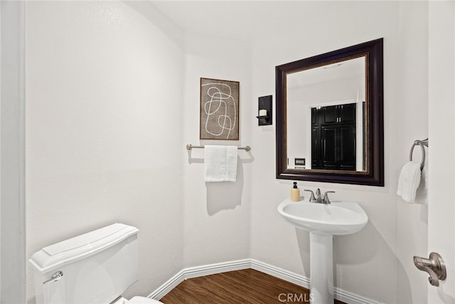 356 Freedom, Upland, CA 91786 - bathroom with baseboards, wood finished floors, and toilet