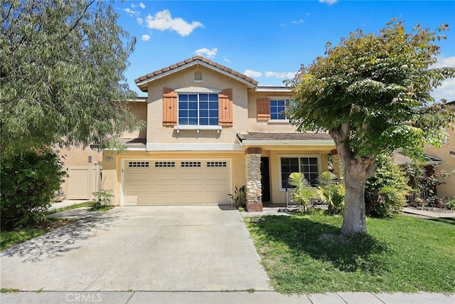 356 Freedom, Upland, CA 91786 - view of front of house featuring stucco siding, a garage, driveway, a tiled roof, and stone siding