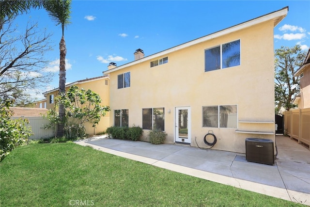 356 Freedom, Upland, CA 91786 - rear view of property with stucco siding, a chimney, and central AC
