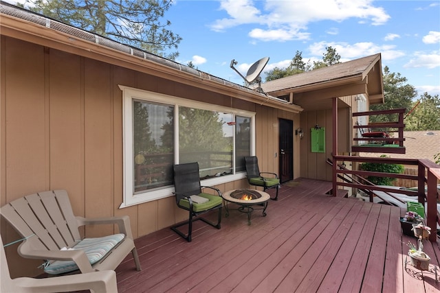 5203 Desert View Dr, Wrightwood, CA 92397 - wooden deck with an outdoor fire pit