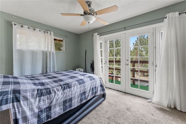 5203 Desert View Dr, Wrightwood, CA 92397 - bedroom with access to outside, carpet flooring, french doors, a textured ceiling, and a ceiling fan