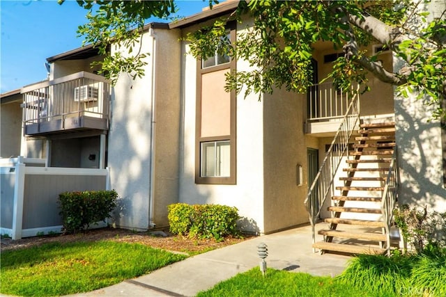 8990 19th St Unit 268, Rancho Cucamonga, CA 91701 - view of building exterior with stairs and fence