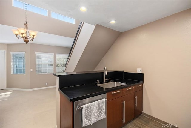 81 Cloudcrest, Aliso Viejo, CA 92656 - kitchen featuring dark countertops, a chandelier, pendant lighting, recessed lighting, and vaulted ceiling