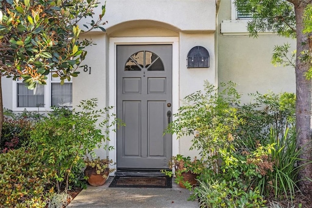 81 Cloudcrest, Aliso Viejo, CA 92656 - doorway to property featuring stucco siding