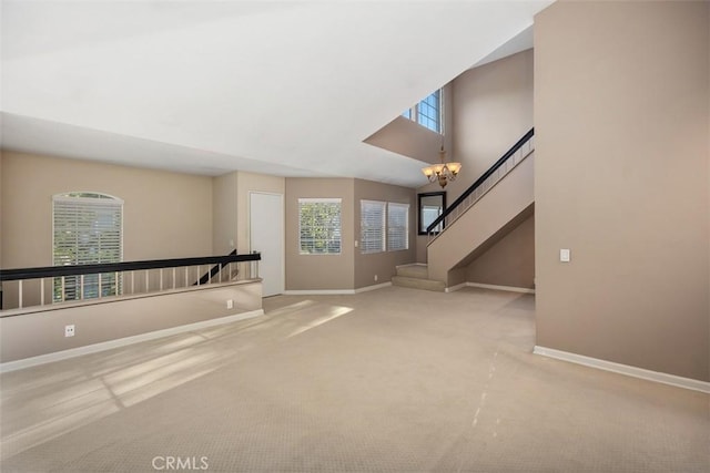 81 Cloudcrest, Aliso Viejo, CA 92656 - unfurnished living room featuring carpet and a chandelier