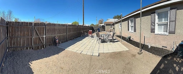 view of patio featuring a fenced backyard