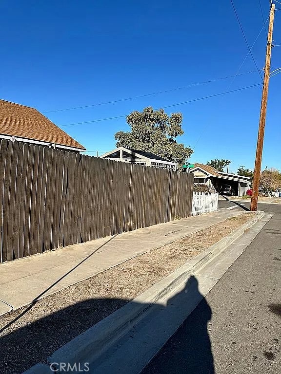 view of street with curbs and sidewalks