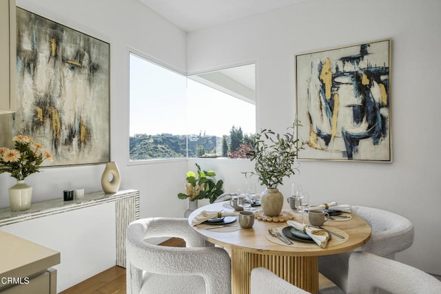 1116 Linda Flora Dr, Los Angeles, CA 90049 - dining area featuring wood finished floors