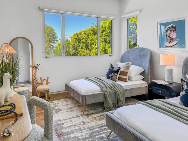 1116 Linda Flora Dr, Los Angeles, CA 90049 - bedroom featuring wood finished floors and baseboards