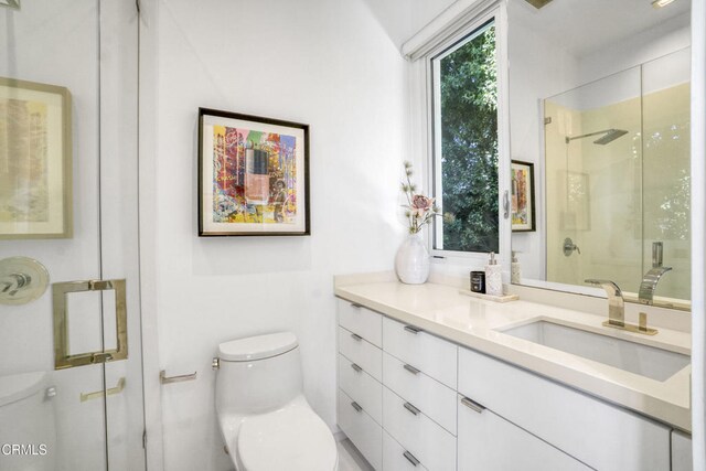 1116 Linda Flora Dr, Los Angeles, CA 90049 - bathroom featuring toilet, a stall shower, and vanity