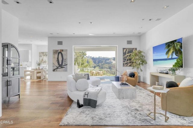 1116 Linda Flora Dr, Los Angeles, CA 90049 - living room with wood finished floors and recessed lighting