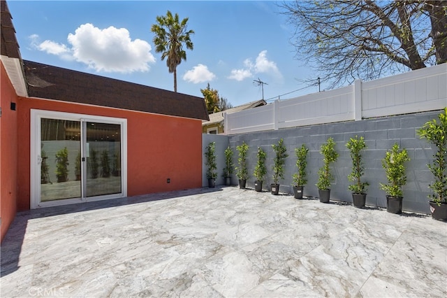 view of patio / terrace with fence