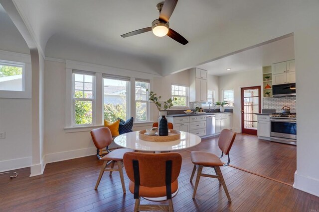 487678 34th St, San Diego, CA 92116 - dining area featuring plenty of natural light, ceiling fan, and dark wood-type flooring