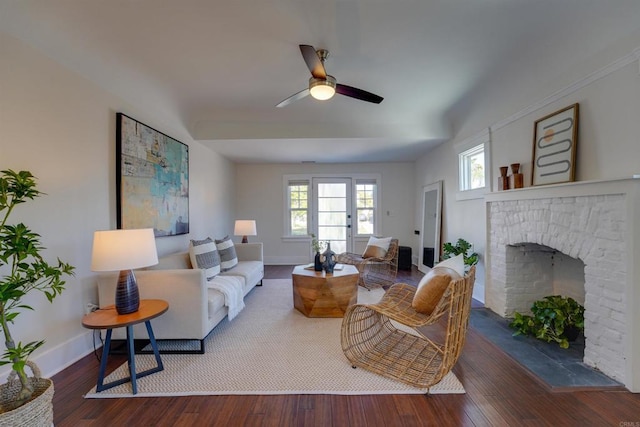 487678 34th St, San Diego, CA 92116 - living room featuring a fireplace with raised hearth, a ceiling fan, and wood finished floors