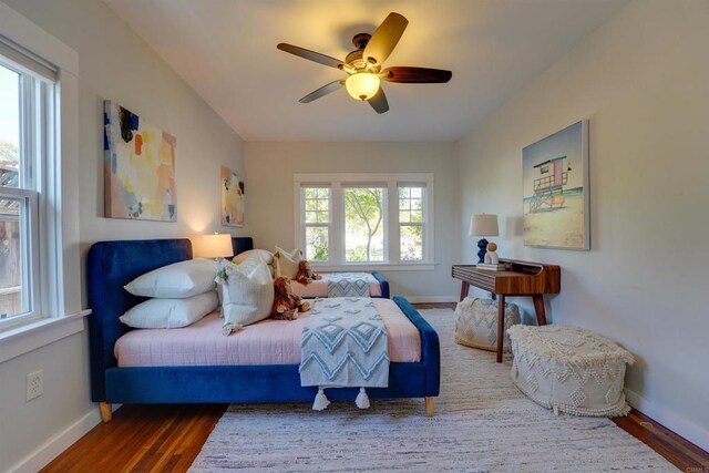 487678 34th St, San Diego, CA 92116 - bedroom with wood finished floors and ceiling fan