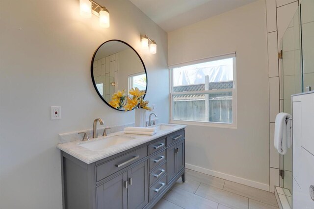 487678 34th St, San Diego, CA 92116 - bathroom featuring double vanity and tile patterned flooring