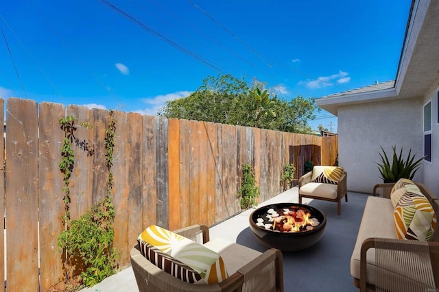 487678 34th St, San Diego, CA 92116 - view of patio / terrace with an outdoor living space with a fire pit