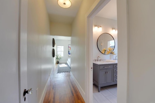 487678 34th St, San Diego, CA 92116 - hall with baseboards and light wood-style flooring