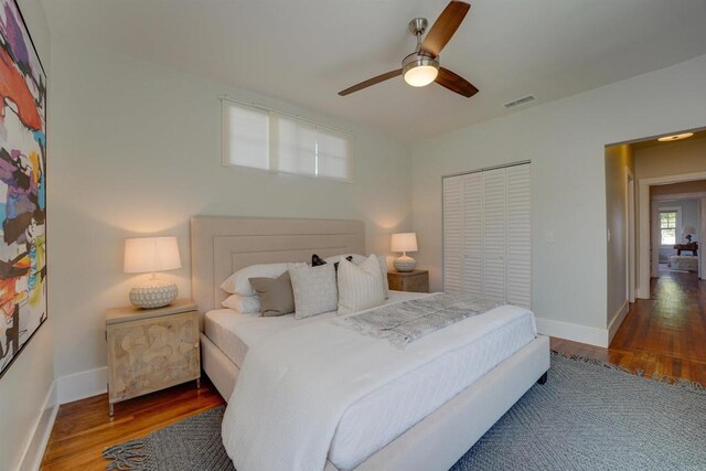 487678 34th St, San Diego, CA 92116 - bedroom featuring wood finished floors, ceiling fan, and a closet