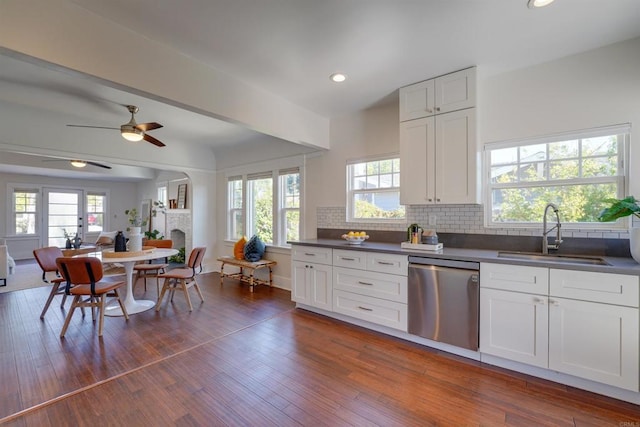 487678 34th St, San Diego, CA 92116 - kitchen featuring dishwasher, dark countertops, backsplash, plenty of natural light, and recessed lighting