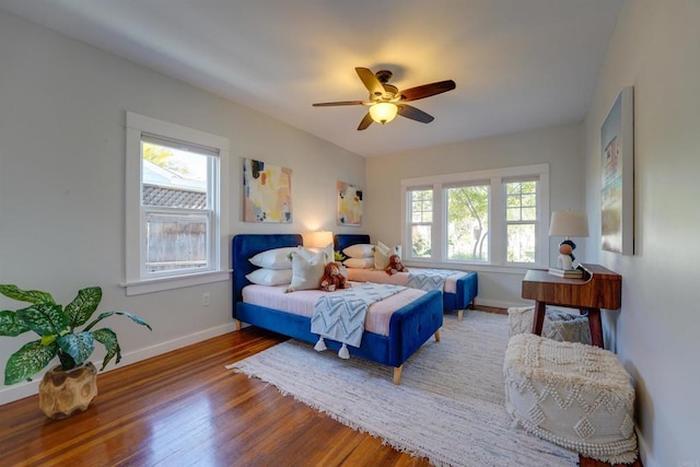 487678 34th St, San Diego, CA 92116 - bedroom with wood finished floors and a ceiling fan