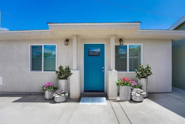 487678 34th St, San Diego, CA 92116 - property entrance with stucco siding and a patio area