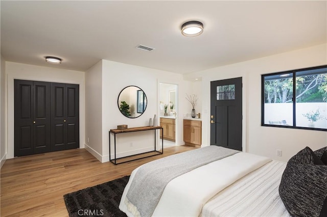 23262 Ellice Cir, Dana Point, CA 92629 - bedroom featuring light wood finished floors, baseboards, and ensuite bath