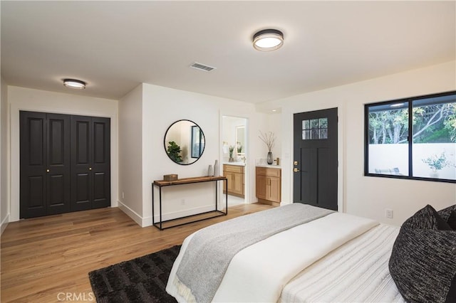 23262 Ellice Cir, Dana Point, CA 92629 - bedroom featuring light wood finished floors and ensuite bathroom