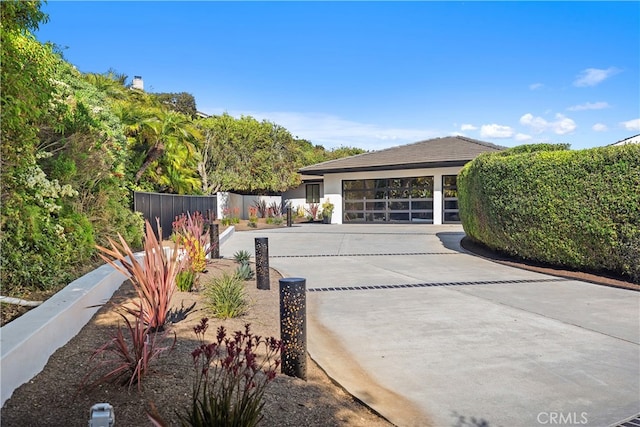 23262 Ellice Cir, Dana Point, CA 92629 - view of patio with concrete driveway, a garage, and fence