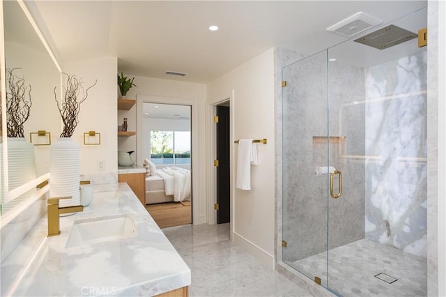 23262 Ellice Cir, Dana Point, CA 92629 - ensuite bathroom with double vanity, a marble finish shower, marble finish flooring, and baseboards