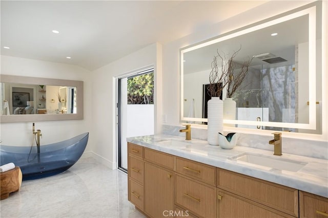 23262 Ellice Cir, Dana Point, CA 92629 - bathroom with double vanity, a freestanding bath, baseboards, a marble finish shower, and recessed lighting