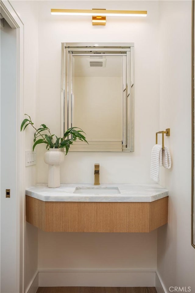 23262 Ellice Cir, Dana Point, CA 92629 - bathroom featuring baseboards and vanity