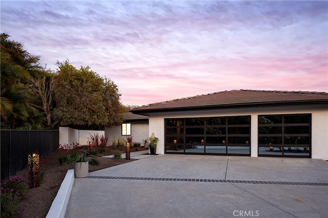 23262 Ellice Cir, Dana Point, CA 92629 - view of front of property featuring driveway, a garage, stucco siding, and a tiled roof
