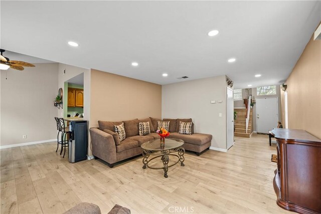 11483 Green Vly, Pacoima, CA 91331 - living room featuring light wood finished floors, stairs, baseboards, recessed lighting, and a ceiling fan