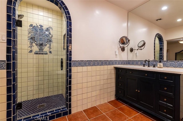 1731 W Kenneth Rd, Glendale, CA 91201 - bathroom with tile patterned flooring, tile walls, a stall shower, vanity, and recessed lighting