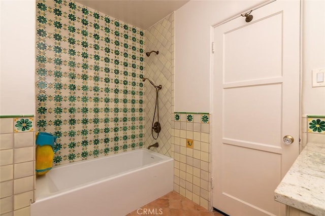 1731 W Kenneth Rd, Glendale, CA 91201 - bathroom featuring tile walls, shower / washtub combination, vanity, and wainscoting